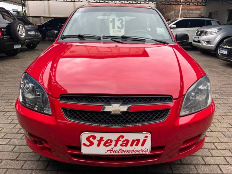 CHEVROLET - CELTA - 2012/2013 - Vermelha - R$ 28.000,00